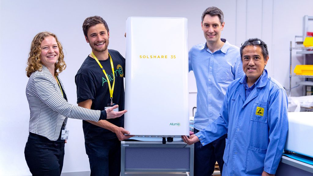 Allume's Kristy Battista and Cameron Knox and PI's Andrew Hornby and Paul Gacutan with the SolShare solar splitting unit.